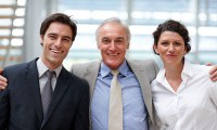 Portrait of confident business people standing together