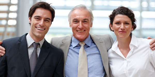 Portrait of confident business people standing together